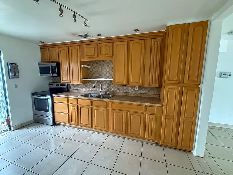 5627 Simms St — Photo 47