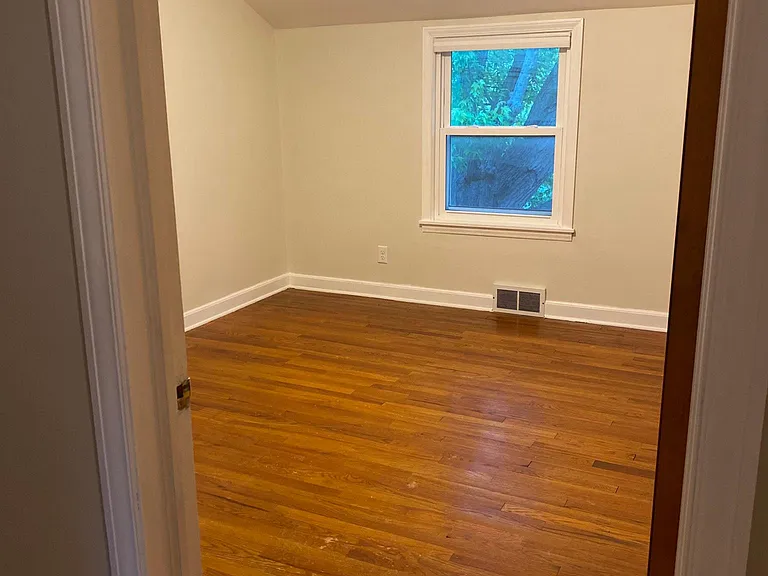 View of bedroom 1 from upstairs hallway