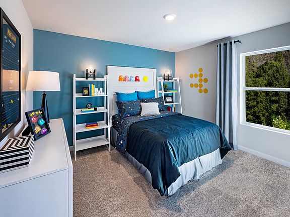Secondary bedrooms give the kids their own space to relax. Photography from Holland Park.
