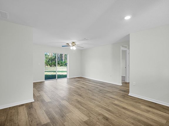 The family room is spacious and opens up easily to the dining room