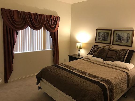 Guest Bedroom with Queen-Sized Bed