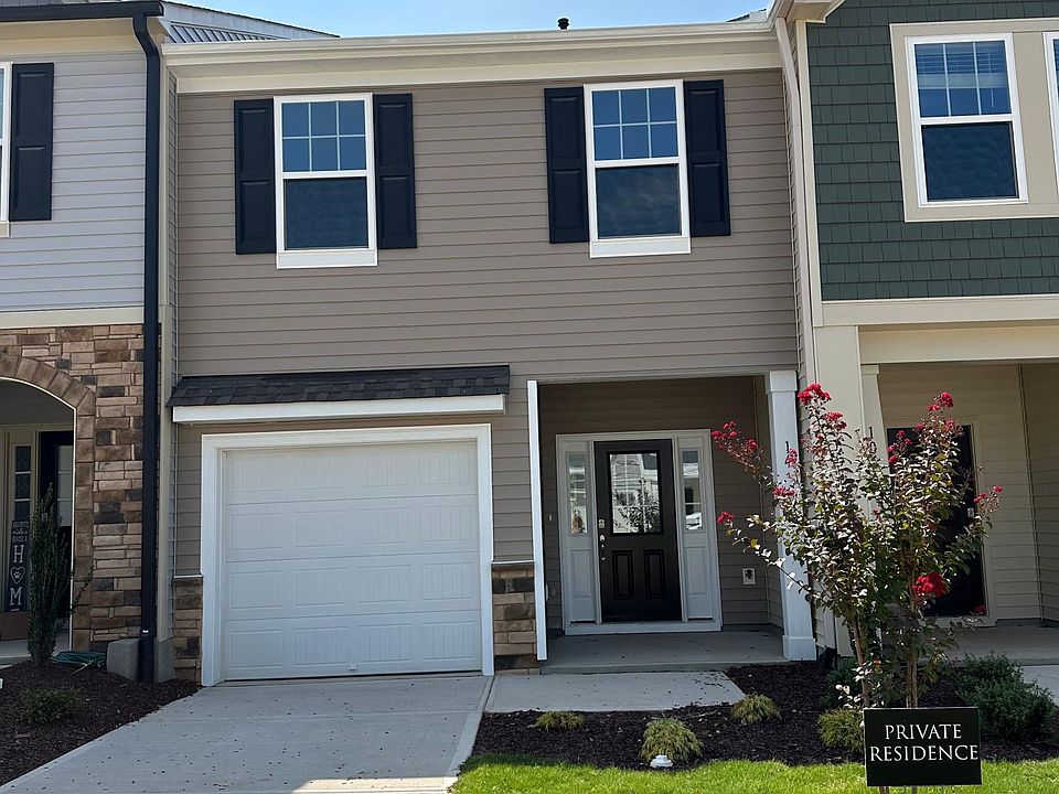 Beautiful EAST facing townhome, 2nd from the corner unit.