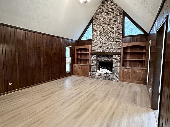 Living room with vaulted ceilings