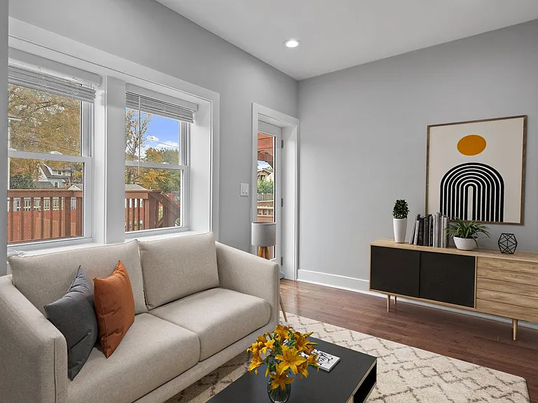 This image shows a virtually furnished space. This space comes unfurnished but can come beautifully furnished by our in-house design team for an additional fee.