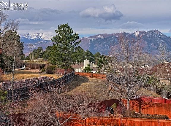 Unobstructed Front Range and Pikes Peak views from the rear of the home*Open space in the rear of the home
