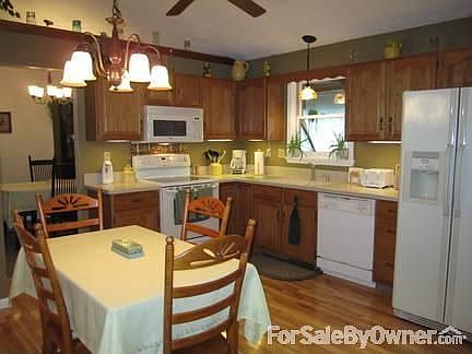 Eat-in Kitchen
						:
						Cozy & comfortable: Corian counters w/2-bowl sink. Appliances in great cond