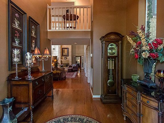 Beautiful wood floors throughout the living areas.  Canned lighting throughout this home along with designer paint colors make this a very warm and welcoming home.