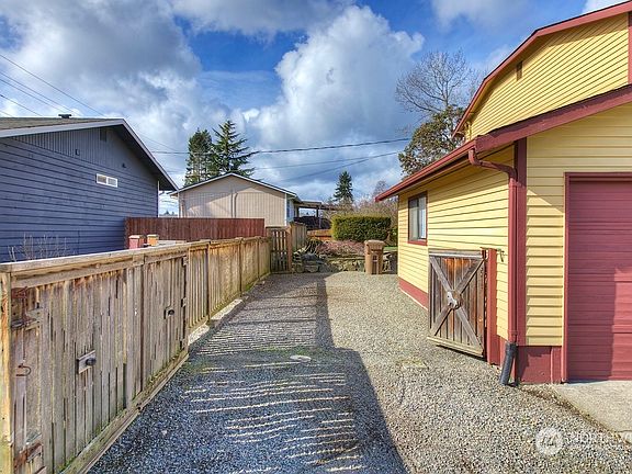 Room for an RV or boat on the side of the house with gates to close off>