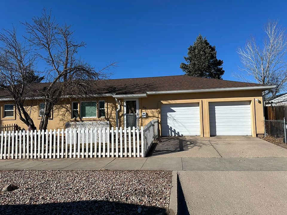 Front of unit. Tenant uses left side of attached garage