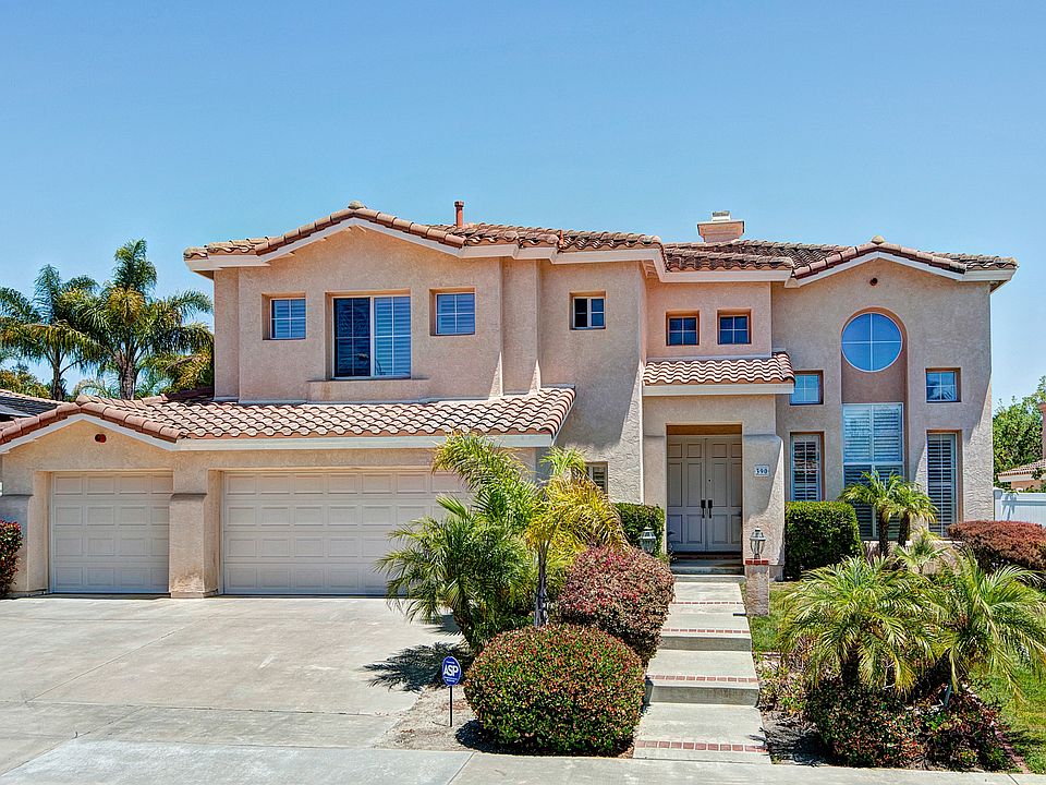 Notice the 3 car garage.