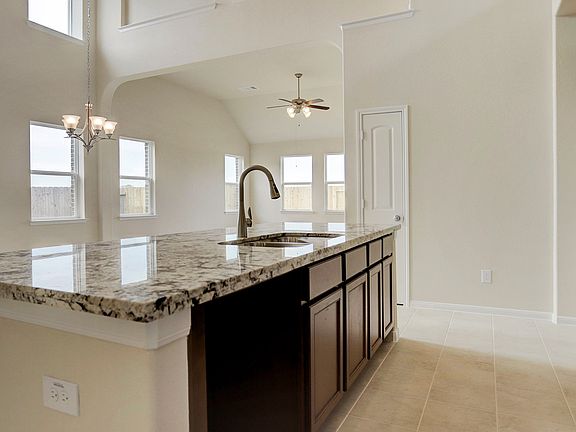 Kitchen is open to the dining area