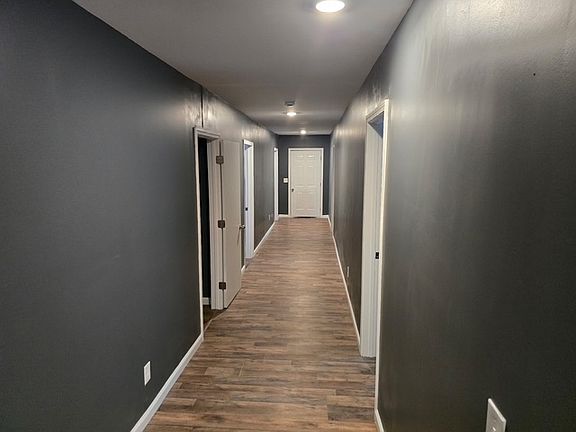 Hallway to bedrooms and full bathroom