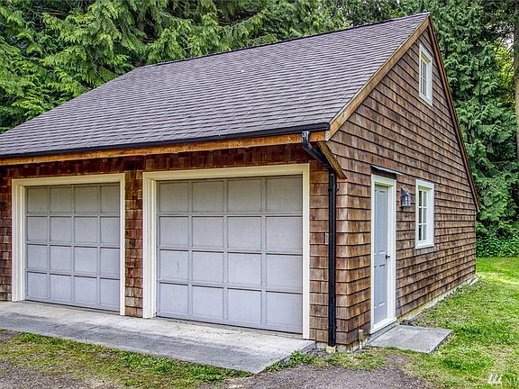 400 sq foot garage/shop has a wood stove.