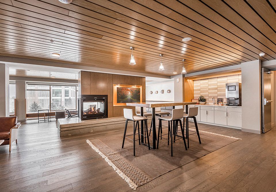 Hang out in our lounge space next to a fireplace and coffee bar.