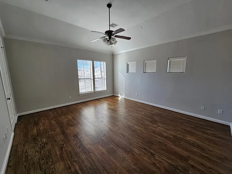 Spacious master with separate his and hers closets