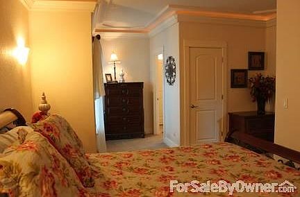 Master Suite
						:
						Rope lighting in crown moulding adds warm glow.