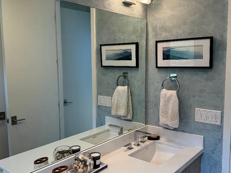 Master bathroom painted in sky blue Venetian plaster