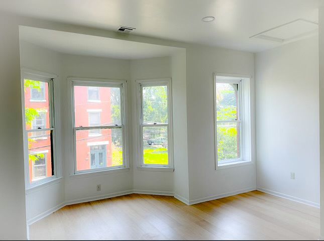 living room with big bay windows