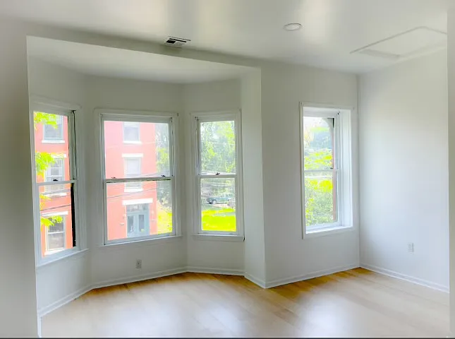 living room with big bay windows