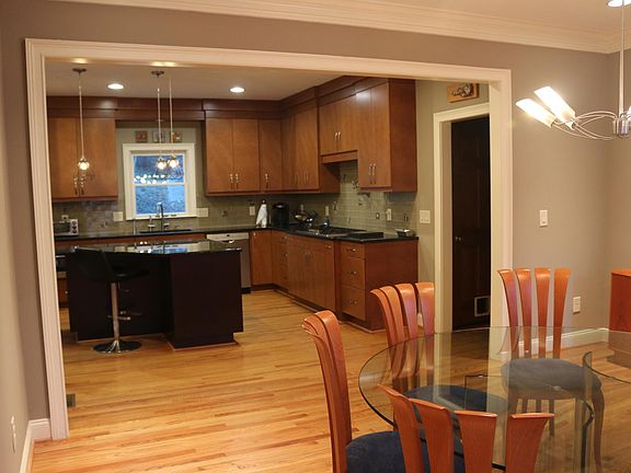 Dining area opens into kitchen - great for entertaining.
