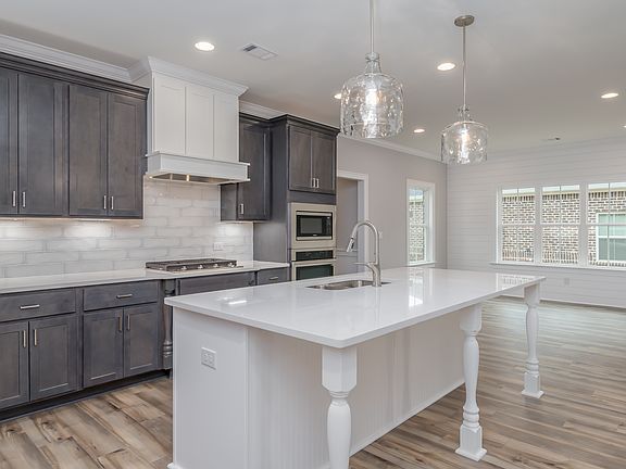 The Huddlestone II by Stone Martin Builders