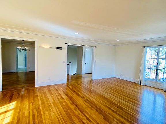 Living room facing dining room and stairs