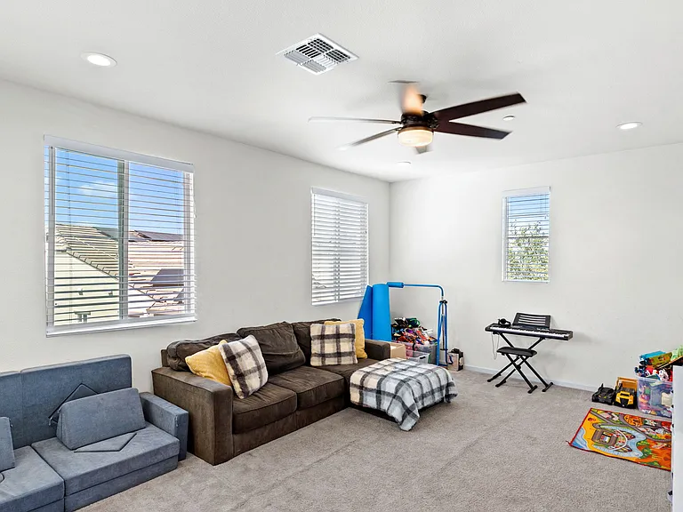 generously sized upstairs large bonus/playroom.