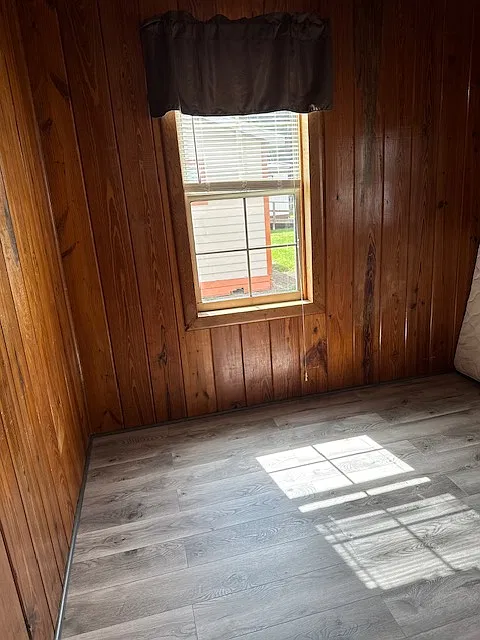 Natural light and warm interior continues in the bedrooms