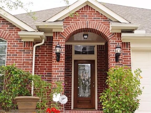 Covered Front Entry to welcome family and friends.