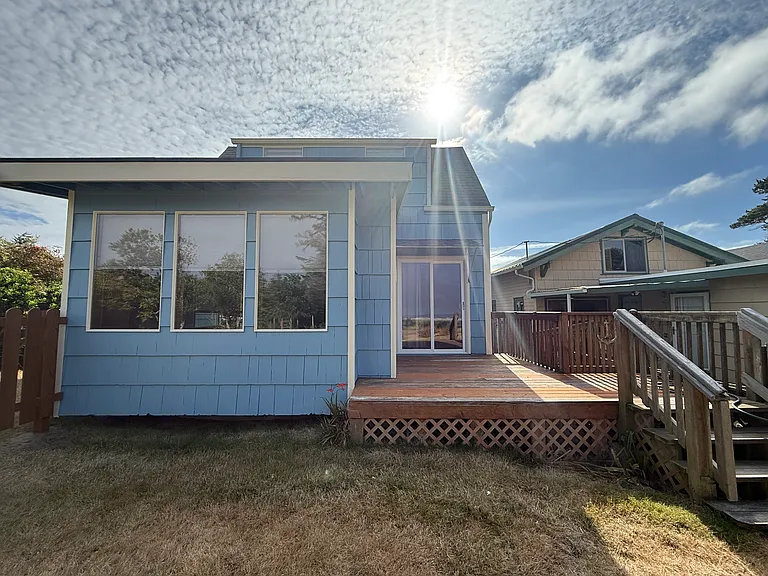 Back of the house to the west deck with ocean view