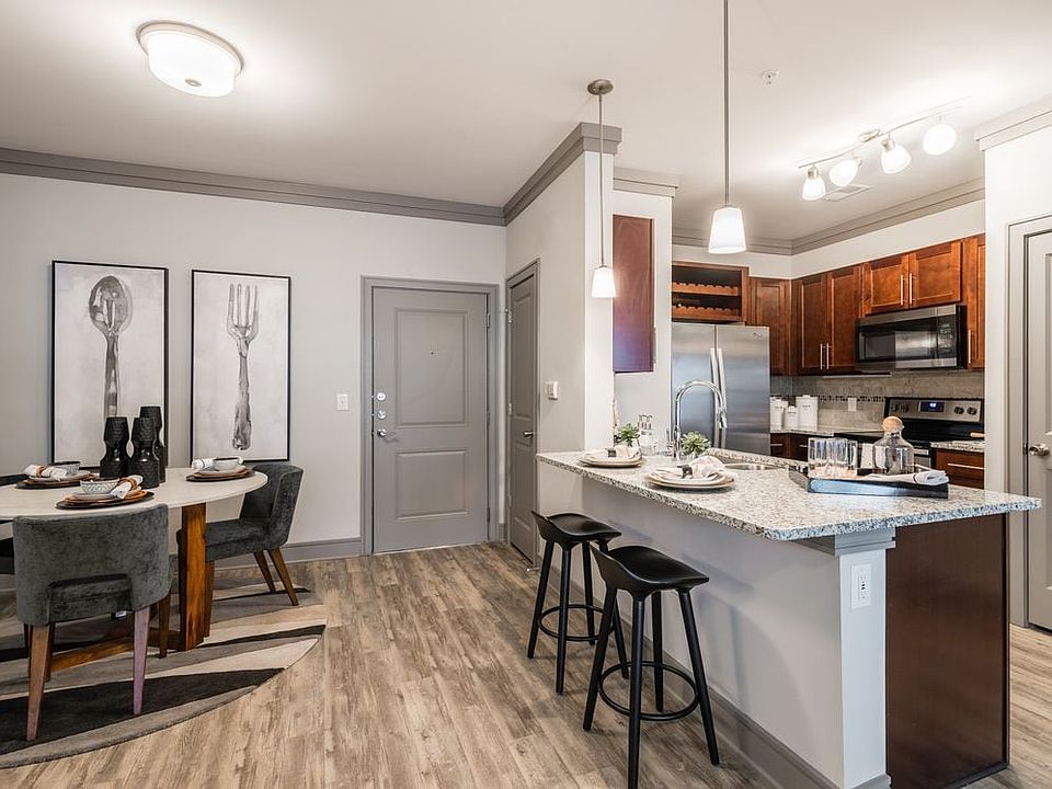 Kitchen and dining areas with hard-surface vinyl plank flooring