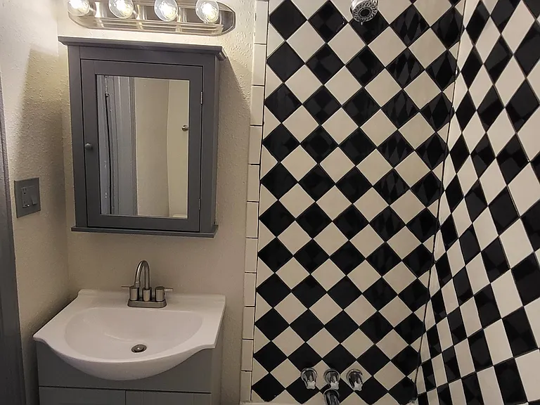 Full bathtub, brand new vanity and toilet!