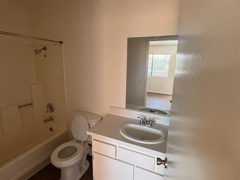 Bathroom vanity and tub area.