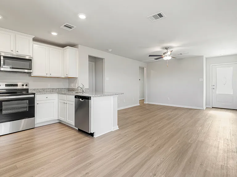 A spacious family room and kitchen.
