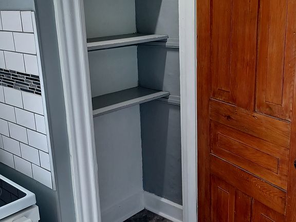 Two Kitchen pantries plenty of storage.