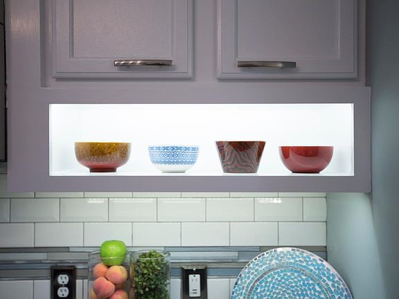 Illuminated open shelving in Kitchen