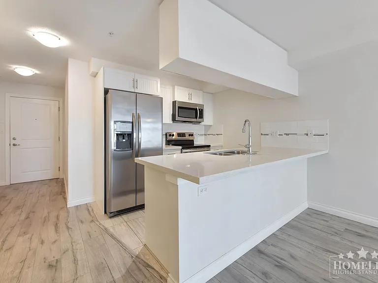 5650 201a St #218 — Photo 4