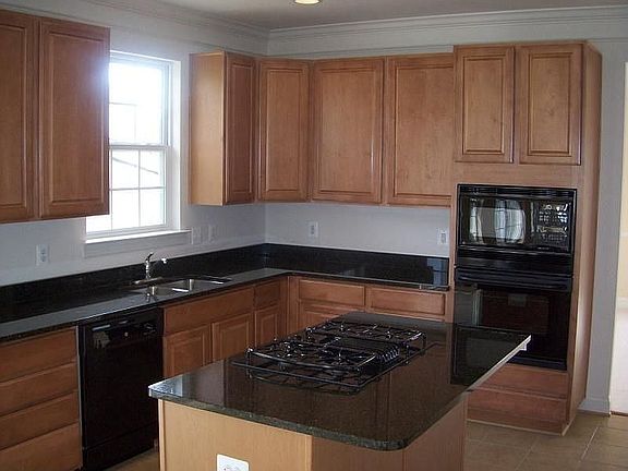 Kitchen with Granite and Upgraded Cabinets