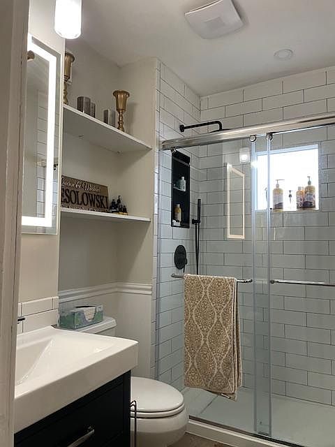Full bath with walk-in shower & Bluetooth speaker ceiling vent