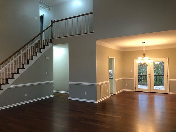 Stairs to upper 3 bedrooms