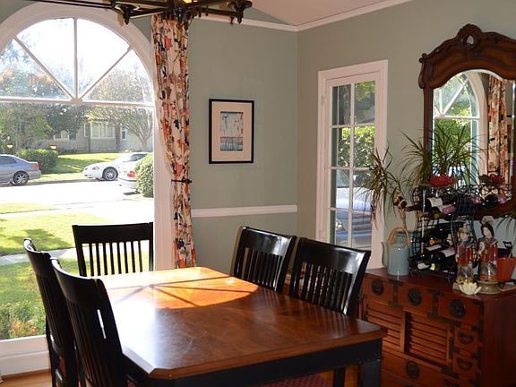 Dining Room with high barrel ceiling and original picture rails
