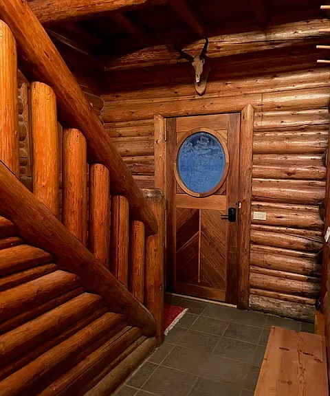 Front door entryway with stairs to upper turret bedrom