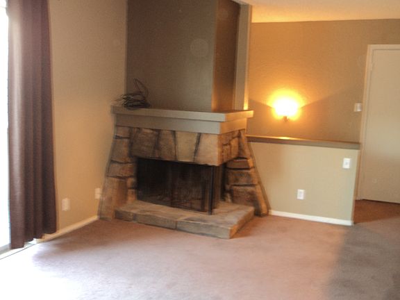 Spacious Liv w/FP & Dr to Balcony