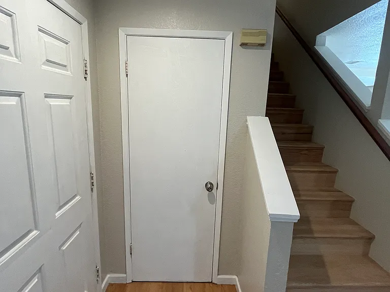 Downstairs Closet by Entrance Door