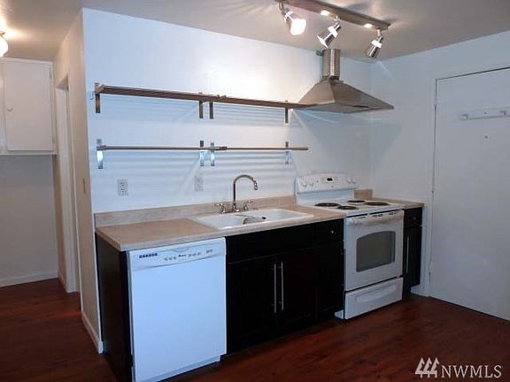 Upper unit kitchen includes dishwasher and nice updates.