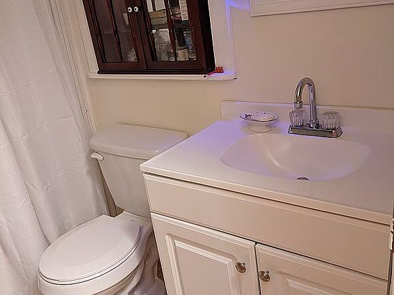 New toilet, faucet, cabinet