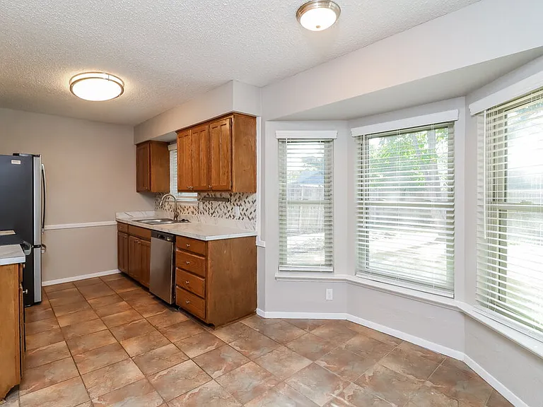 5911 Woodsetter Ln — Photo 8