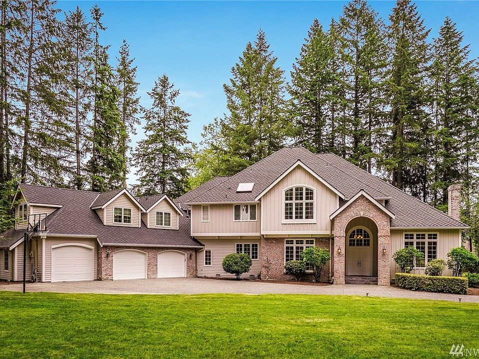 Welcome to this stunning Estate, close in on a horse acre lot.