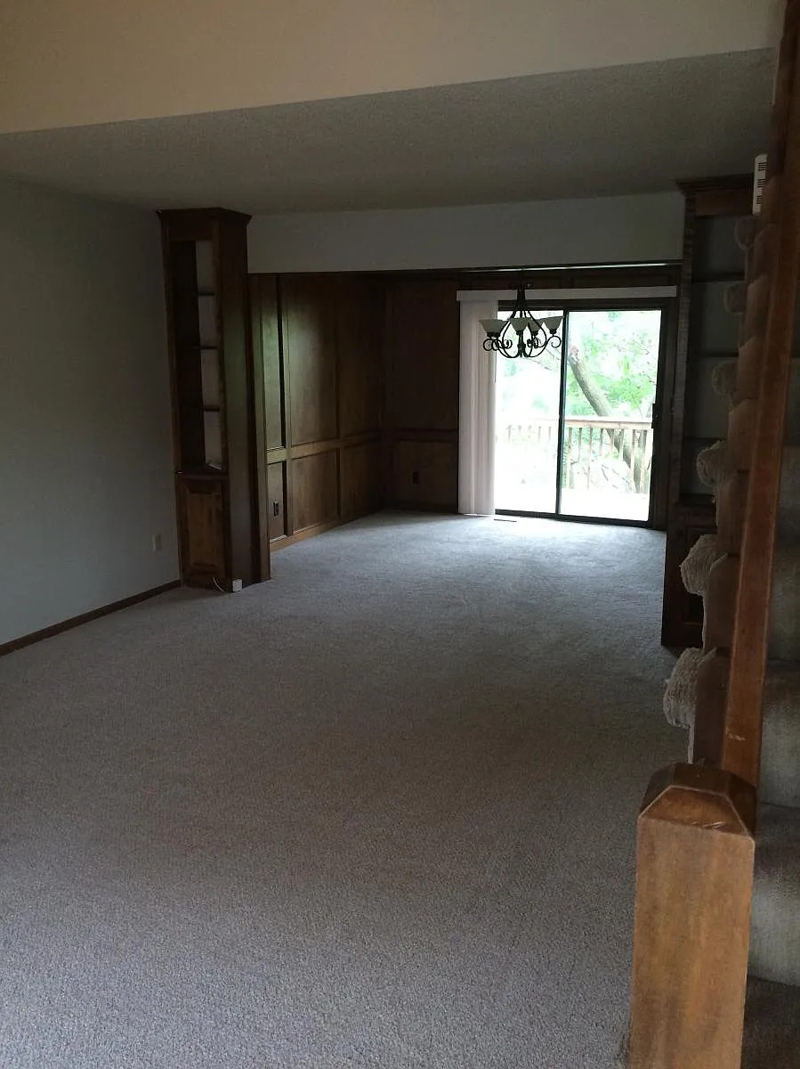 View of living room and dining room. Brand new paint. Bran - 8908 W 77th St