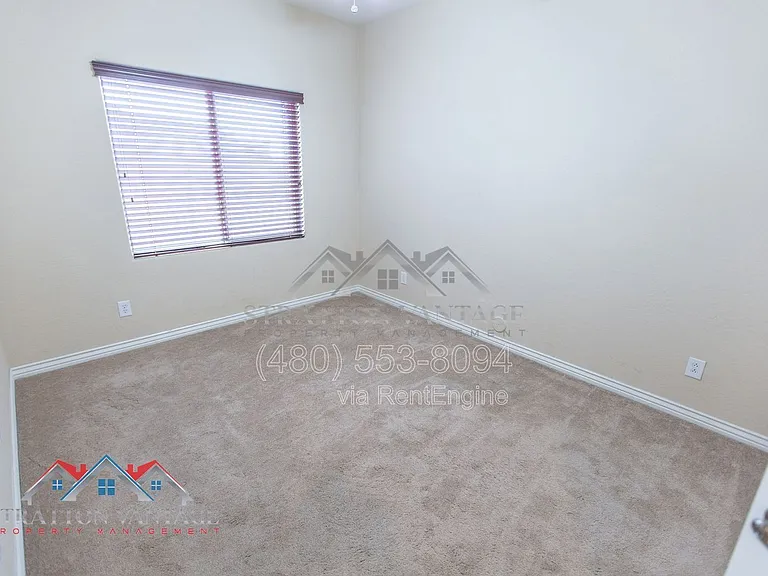 11751 W Daley Ln — Photo 27